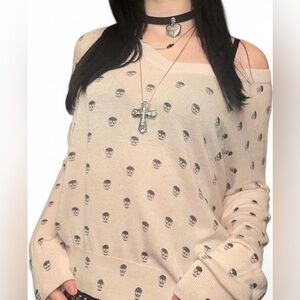 SOLD ! baby pink and black skull v neck sweater
